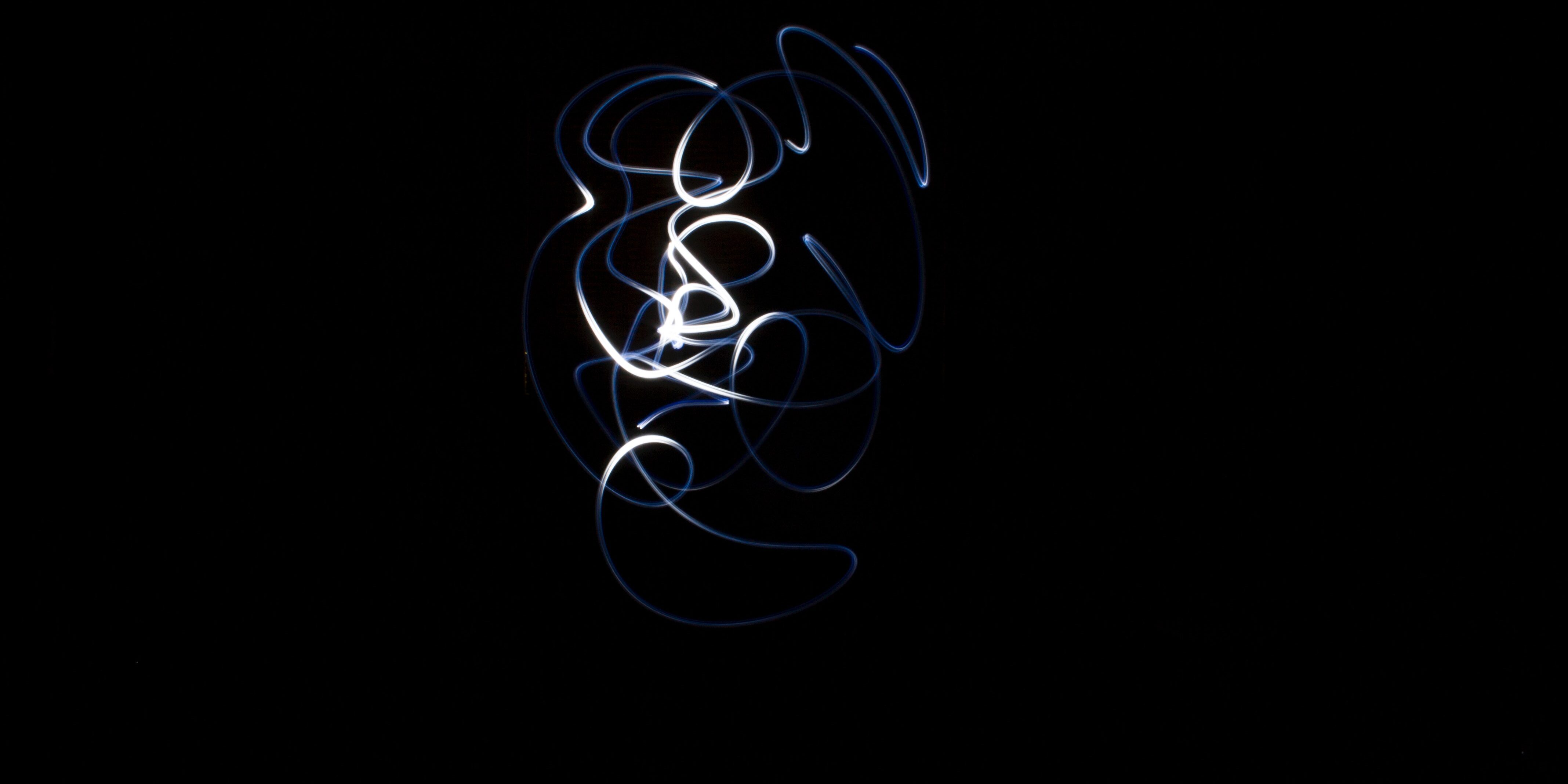 Dark background with light tracers